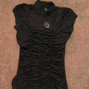 Around the Neck Top With Lace over chest area.
